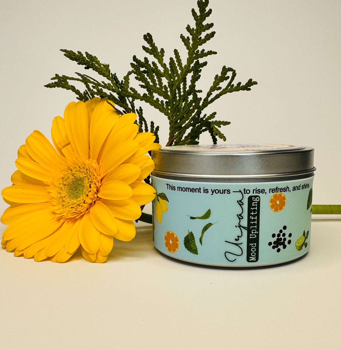 Urjaa essential oil blend with peppermint, sweet orange, and lemon for energizing, refreshing, and uplifting the mood
