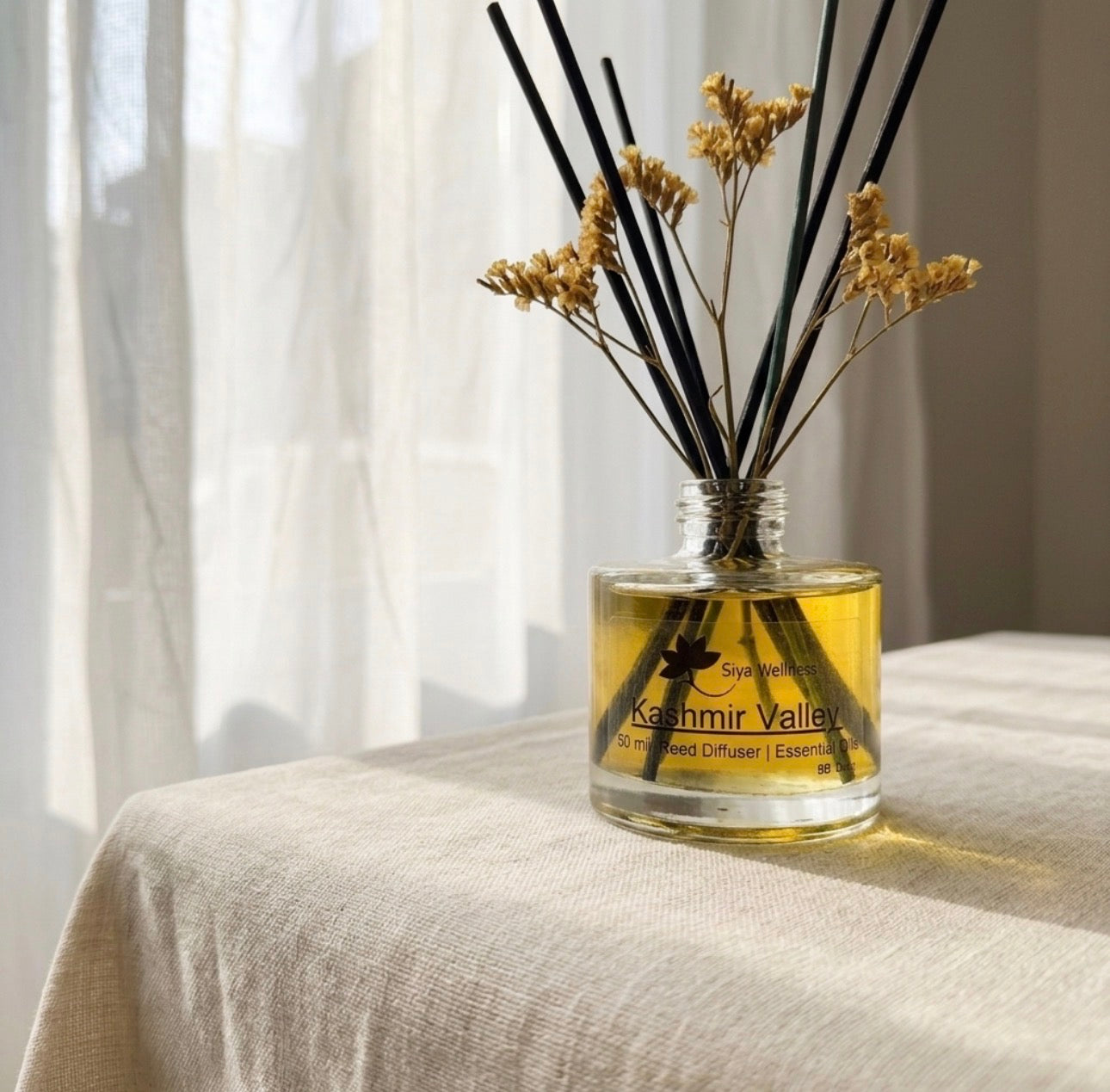 Sandalwood essential oil reed diffuser by Siya Wellness, warm woody aroma diffuser for home, natural aromatherapy and long-lasting fragrance
