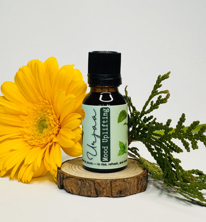 Urjaa essential oil blend with peppermint, sweet orange, and lemon for energizing, refreshing, and uplifting the mood